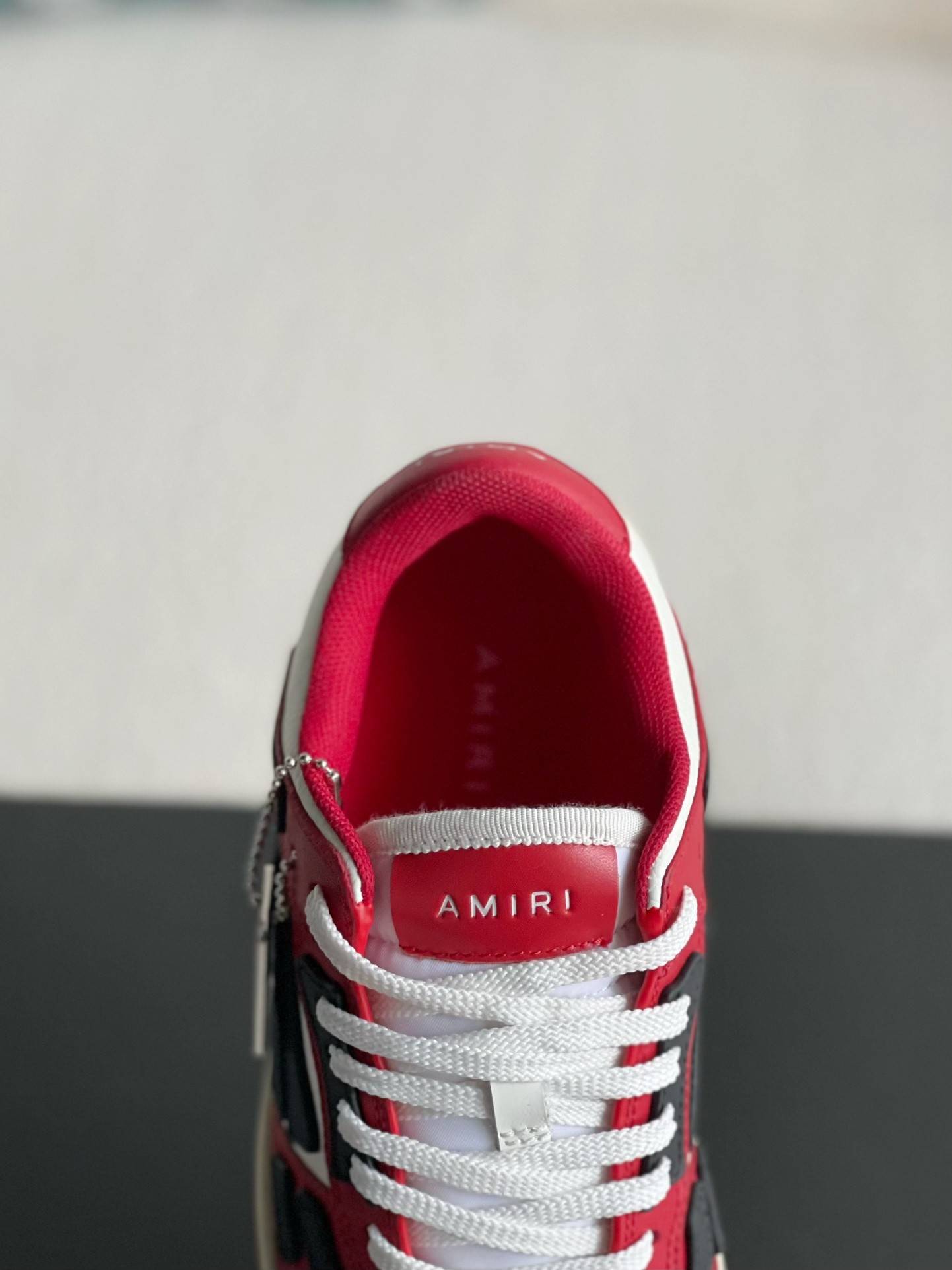 A*RI Bone Sneakers
