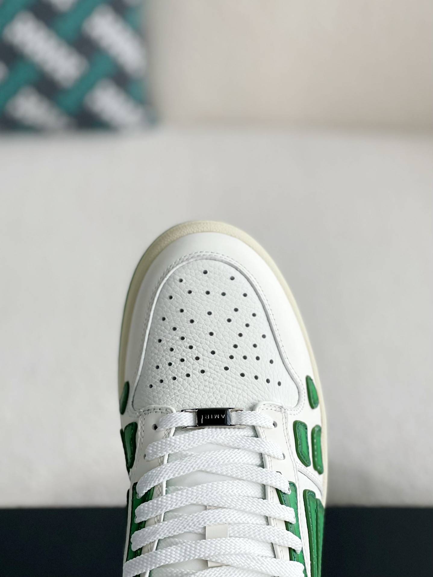 A*RI Bone Sneakers