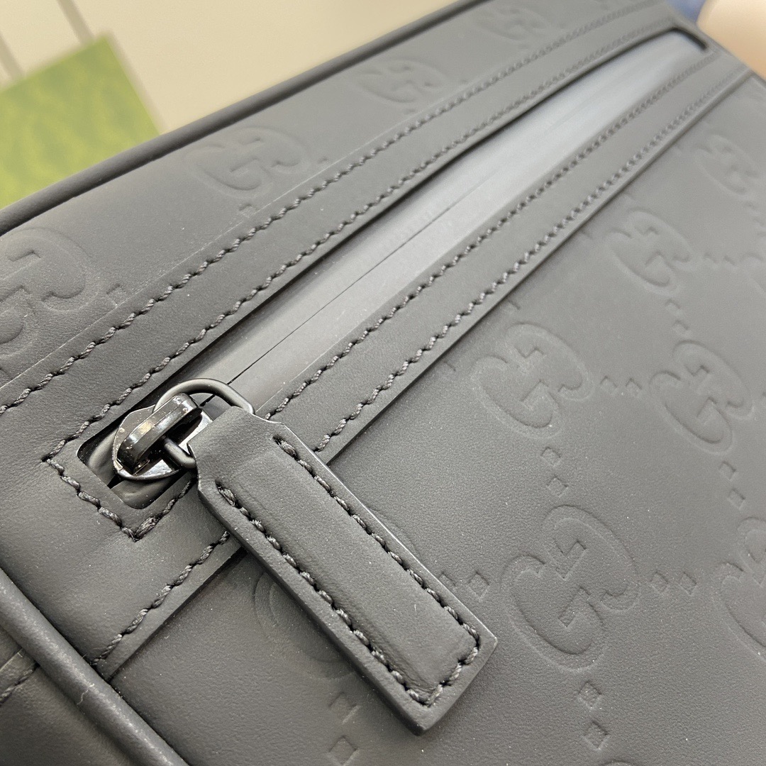 G*u*i crossbody bags a range of men's bags in black rubber effect leather model: 771293. dimensions: 17* 24* 5cm