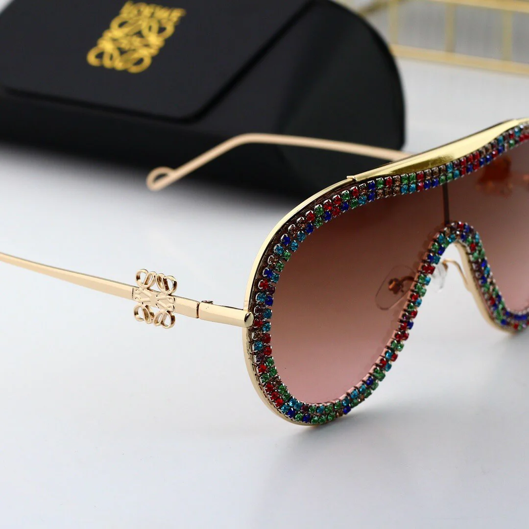fashionable Di*m*nd shield sunglasses